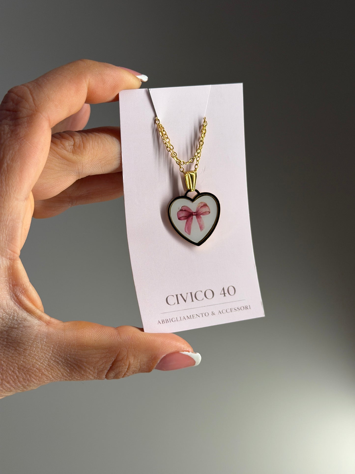Collana fiocchetto rosa