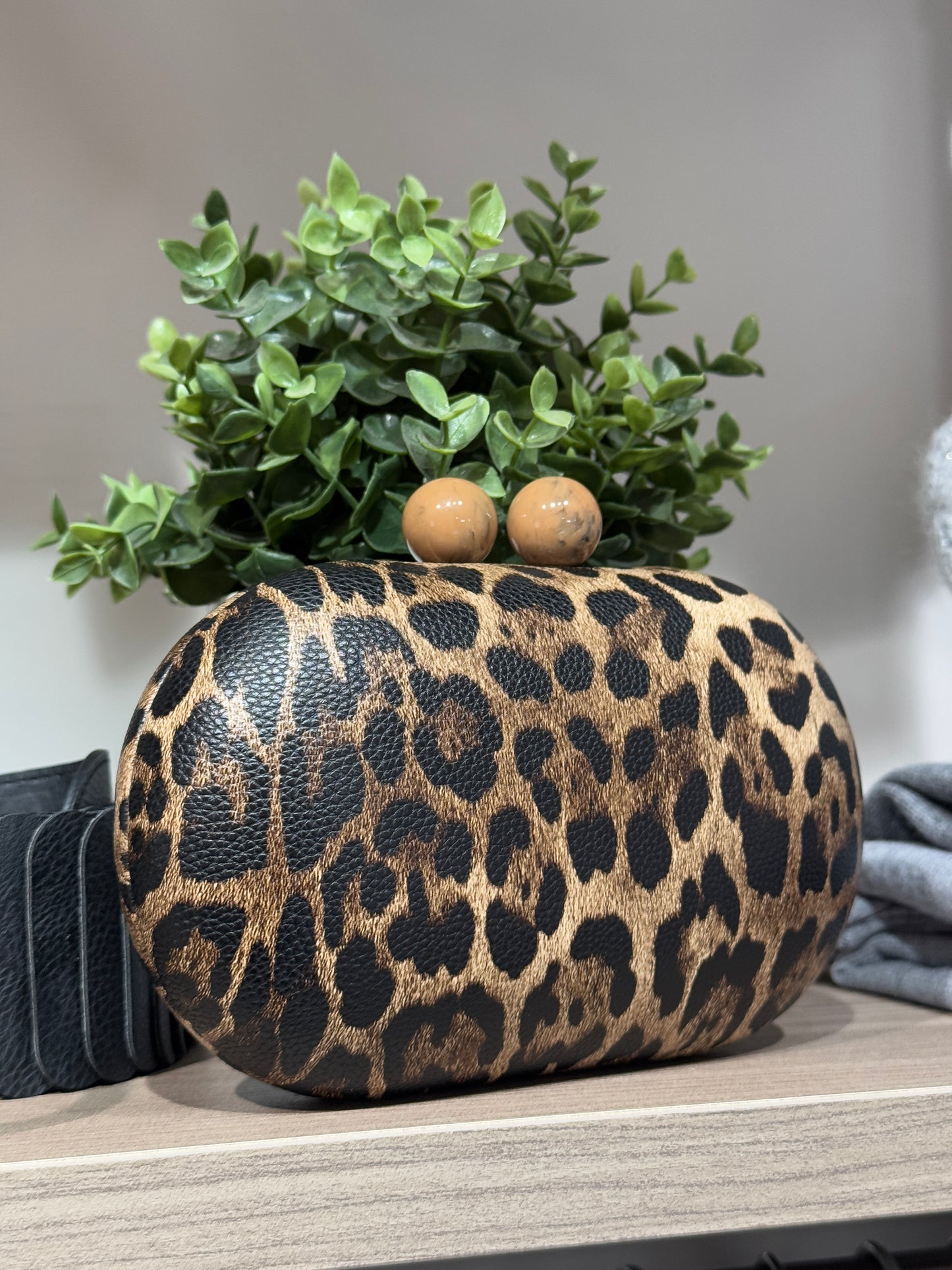 Clutch animalier scuro