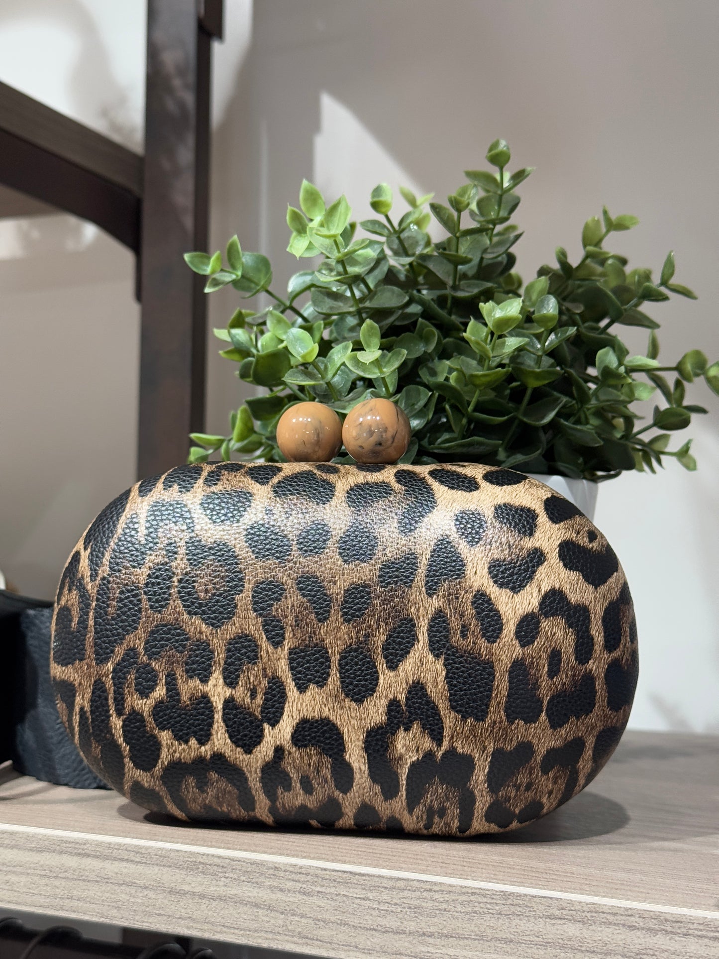 Clutch animalier scuro